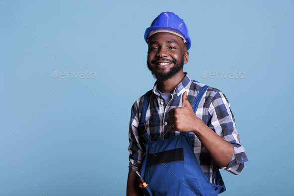 Proud african american professional electrician - Stock Photo - Images
