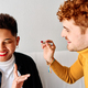 Gay couple having fun while applying make up at home - PhotoDune Item for Sale