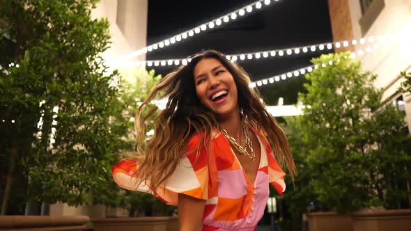 Young Sexy Excited Woman in Summer Dress Dancing on the Street at Night Slowmo alt