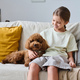 Little girl sitting with her pet at home - PhotoDune Item for Sale