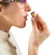 Wine tasting, woman sniffing a wine cork, isolated - PhotoDune Item for Sale