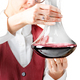 Sommelier with red wine in decanter, close-up, isolated - PhotoDune Item for Sale