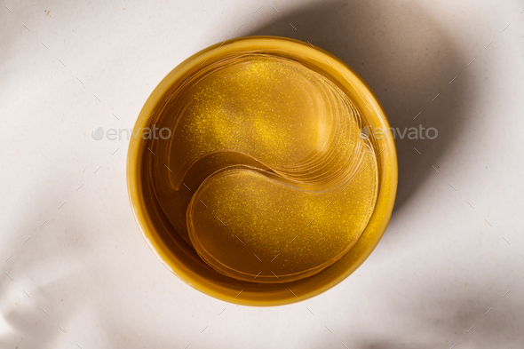 Gold moisturizing eye patches in a package - Stock Photo - Images