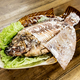 Salt crusted barbecue fish is popular street food in Thailand. - PhotoDune Item for Sale