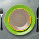 Color ceramic plates on gray background top view - PhotoDune Item for Sale
