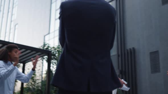 Joyful Boss Share News on Successful Contract Outdoors alt