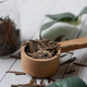 Dry tea leaves on spoon close up . - PhotoDune Item for Sale