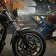 Motorcycles range in garage shop, repaired motorbikes ready for selling - PhotoDune Item for Sale