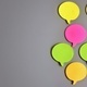 Top view image of colorful speech bubble on gray background - PhotoDune Item for Sale
