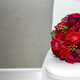 Red rose bouquet on chair with free space. Love and valentine background concept. - PhotoDune Item for Sale