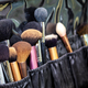Many makeup brushes in bag. Beauty background concept. - PhotoDune Item for Sale