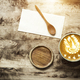 Latte coffee cup and spoon on wood table in cafe with free copy space. - PhotoDune Item for Sale