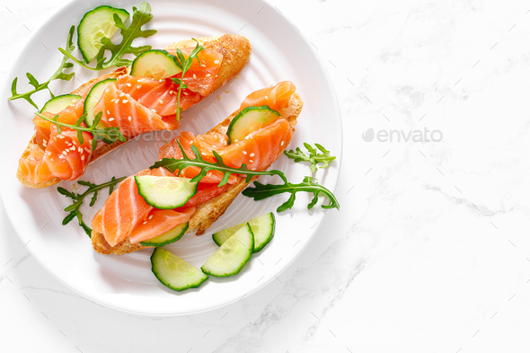 Sandwiches with salted salmon. Healthy food, breakfast. Top view - Stock Photo - Images