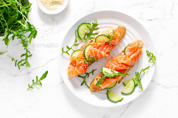 Sandwiches with salted salmon. Healthy food, breakfast. Top view - Stock Photo - Images