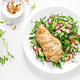 Chicken fillet baked in breadcrumbs and fresh vegetable salad of radish and cucumber. Top view - PhotoDune Item for Sale