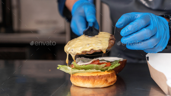 Cook working in a food truck Stock Photo by frimufilms | PhotoDune