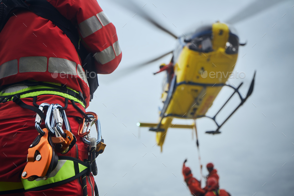 Safety harness of paramedic of emergency service in front of helicopter - Stock Photo - Images