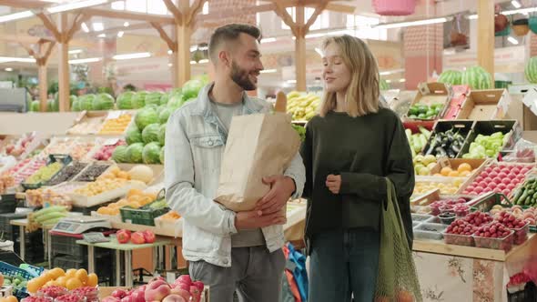 Portrait of Couple at Market alt