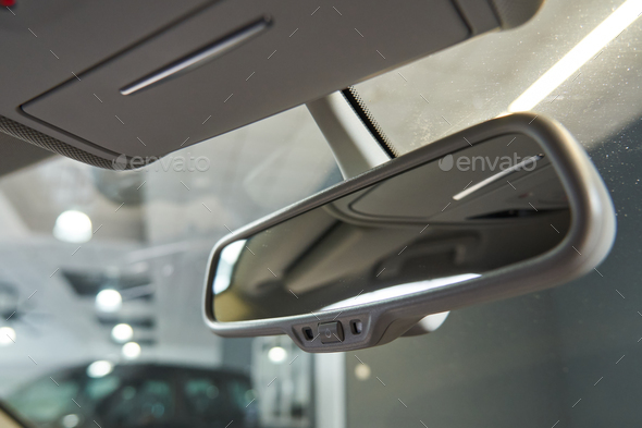 interior rear-view mirror with auto-dimming function and eyeglass window in the ceiling