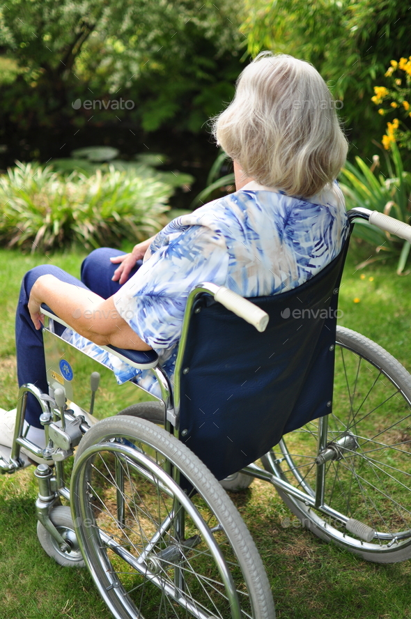 Old woman in wheelchair Stock Photo by fredlackner | PhotoDune