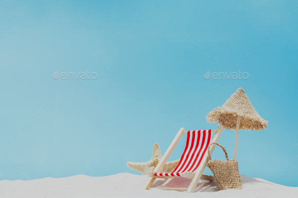 Vacation, beach, travel concept. Composition with lounger, chair, bag on sand - Stock Photo - Images