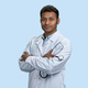 Smiling male indian doctor wearing medical coat and stethoscope. - PhotoDune Item for Sale