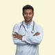 Portrait of male indian doctor with folded arms. - PhotoDune Item for Sale