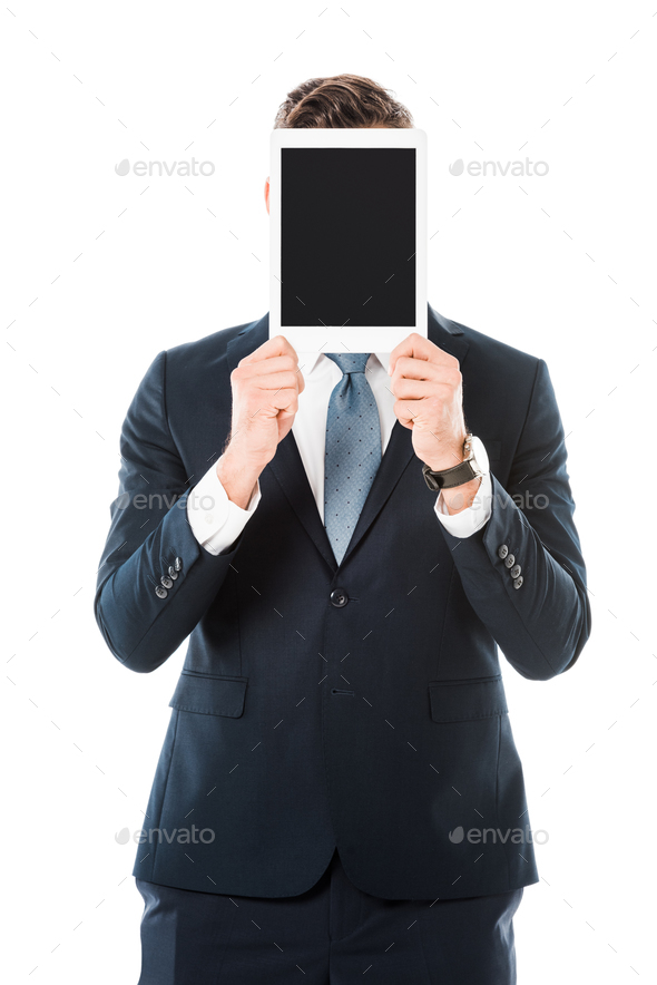 businessman with obscure face holding digital tablet with blank screen isolated on white