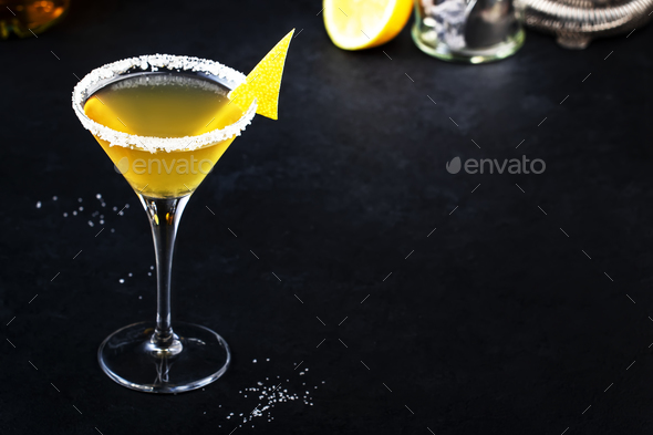 Yellow bird cocktail with white rum, liquor and lime juice in martini glass