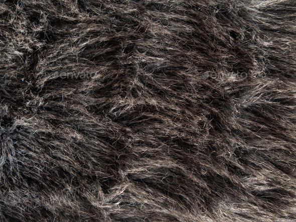 Long gray fake fur texture cover Synthetic fiber soft faux fur macro photo Monochrome fluffy surface