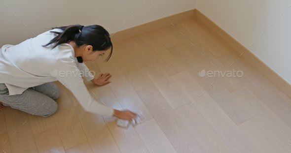 Asian Woman clean the floor for spring clean