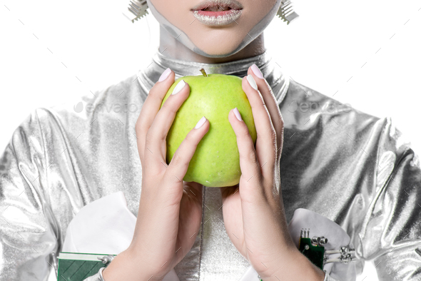 cropped image of silver robot holding apple isolated on white, future technology concept