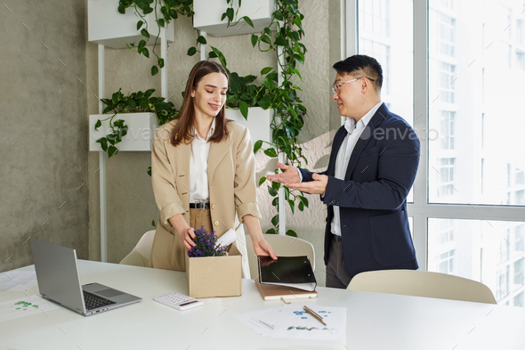 Job position acceptance. Happy woman getting new job offer indoors in modern office, holding box
