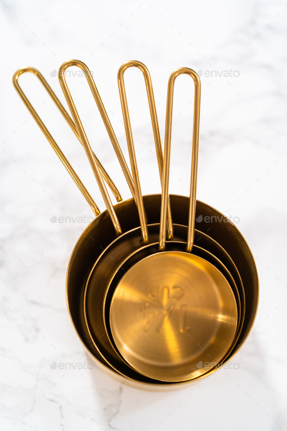 Measuring cups and spoons Stock Photo by arina-habich