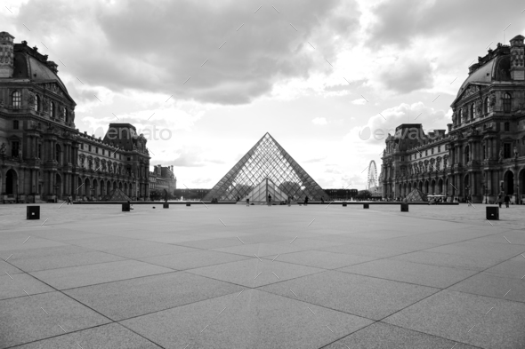 Louvre Museum Pyramid in Paris - France - Stock Photo - Images