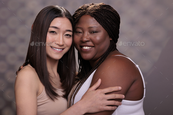 Diverse women hugging demonstrating confidence, love and self care