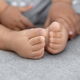 Infant baby feet at natural light, babyhood and childhood concept - PhotoDune Item for Sale