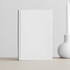 White book mockup with a candle on the beige table. - PhotoDune Item for Sale