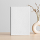 White book mockup with a lavender decoration on the wooden table. - PhotoDune Item for Sale