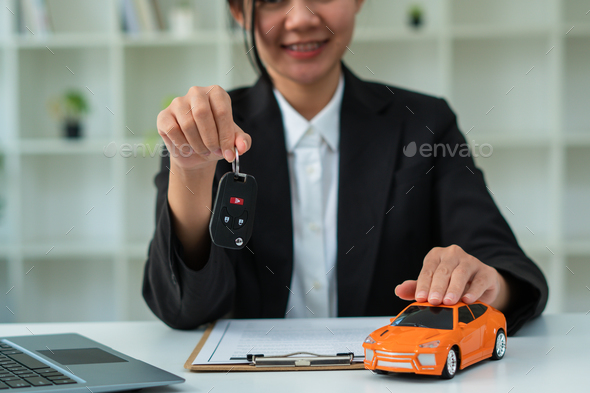 Sale agent handed over the rental car key to the customer who signed the contract and the terms of t