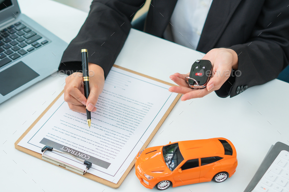 Sale agent handed over the rental car key to the customer who signed the contract and the terms of t