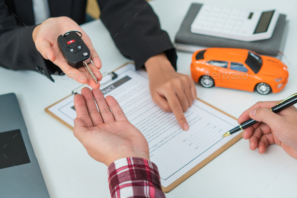 Sale agent handed over the rental car key to the customer who signed the contract and the terms of