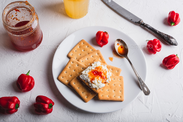 Crackers with Cream Cheese and Hot Pepper Jam - Stock Photo - Images