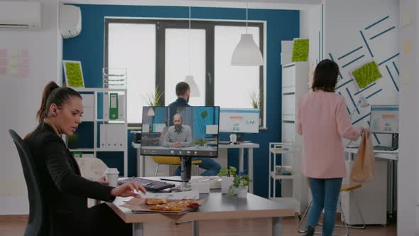 Businesswoman Having Delivery Takeaway Lunch Meal Order During Takeout Lunchtime at Desk alt