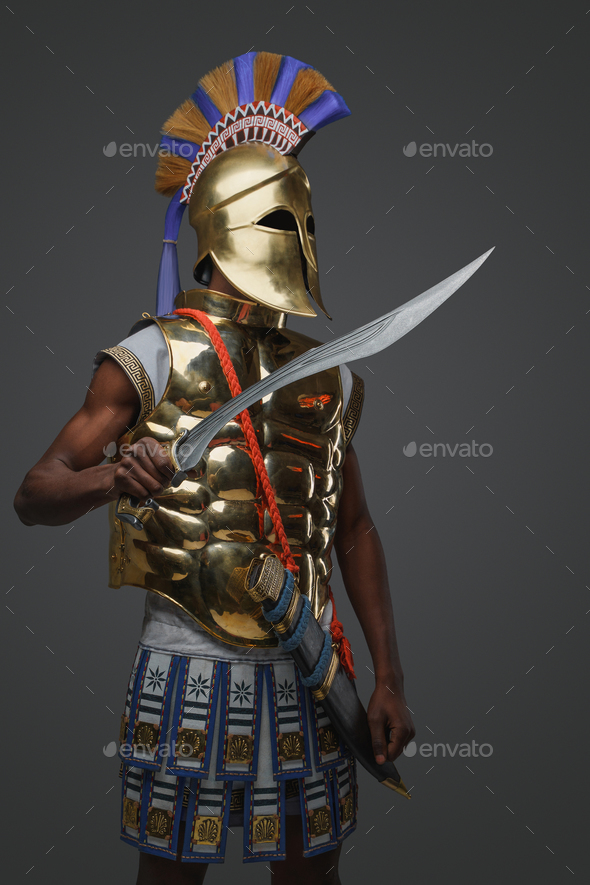 Black soldier from greece with sword and plumed helmet - Stock Photo - Images