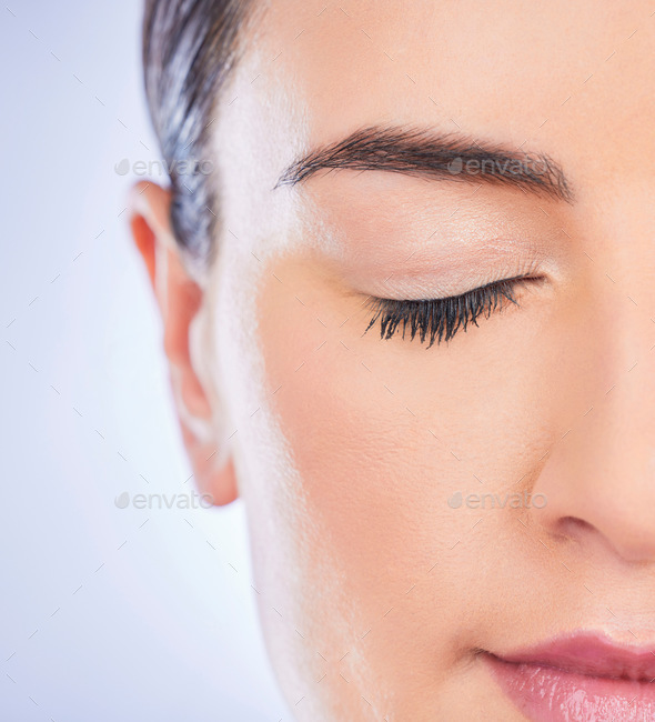 Closeup, beauty and woman with skincare, organic facial and treatment on studio background. Zoom, f