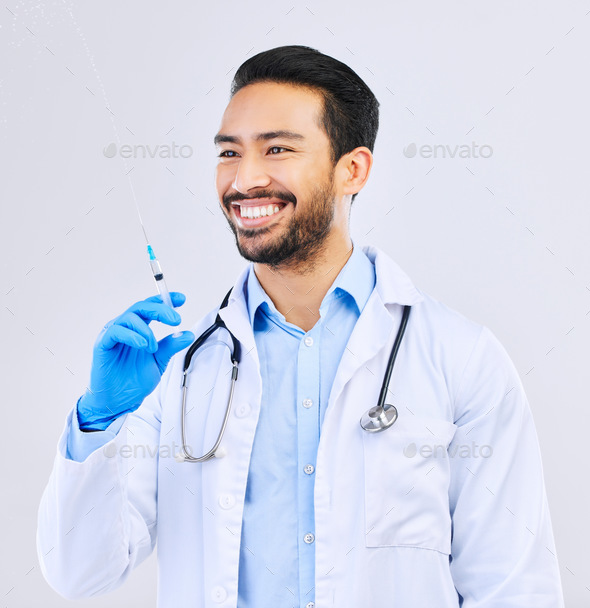 Doctor with smile, syringe and vaccine in studio for healthcare, medicine and medical innovation. V