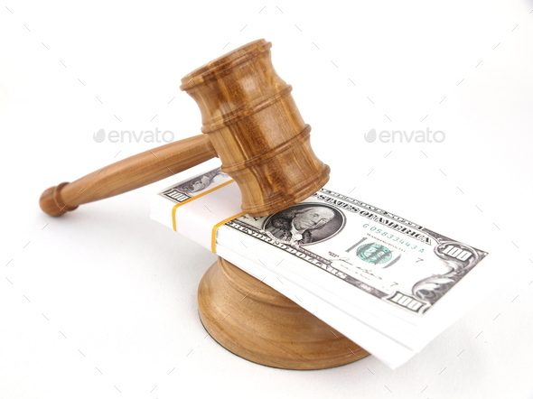 Auction gavel and dollars - Stock Photo - Images