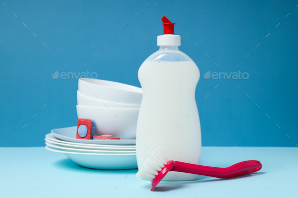 Laundry accessories on white table against blue background Stock Photo by  AtlasComposer