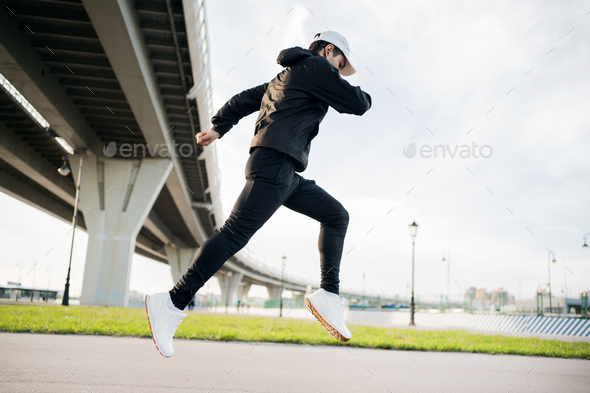 Athletic Sport Runner Man Running In Urban Training Stock Photo